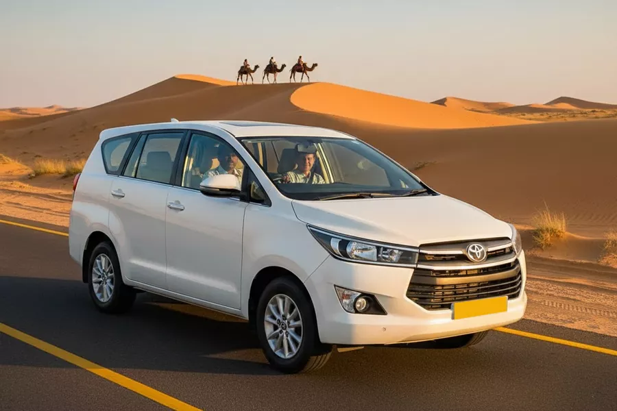 A traveler shaking hands with a professional driver beside a clean SUV, beginning their Rajasthan tour