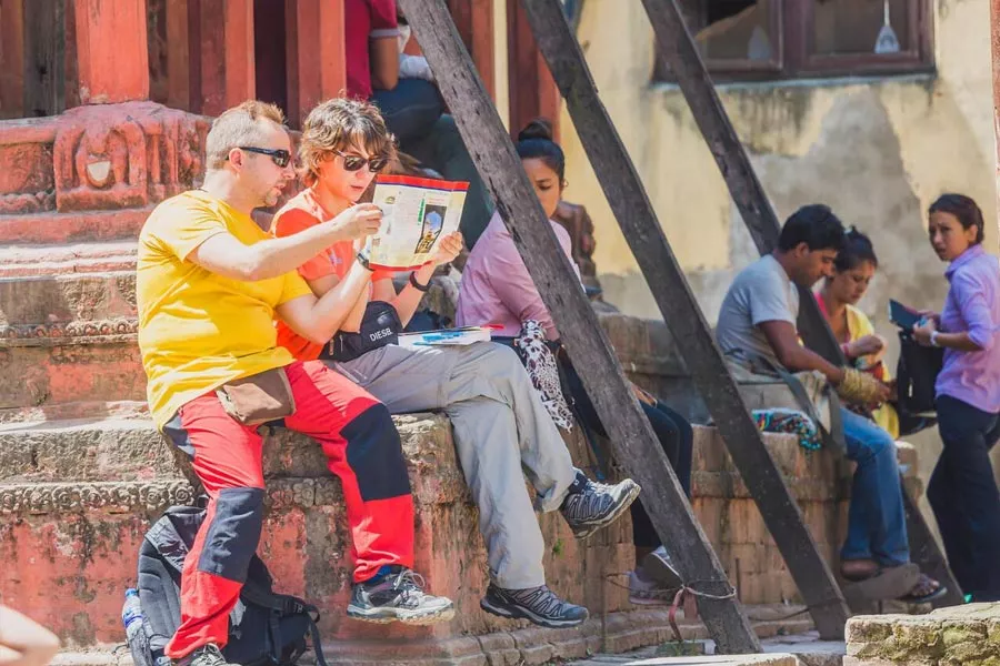 Tourists visiting India safely at Taj Mahal